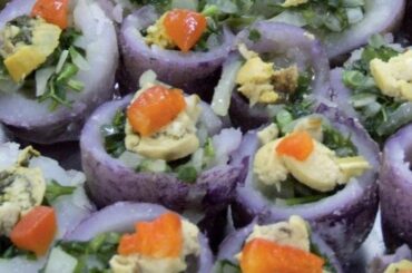 Chilean meñarki potatoes stuffed with corn, peas, and red pepper