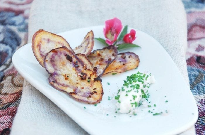 Baked purple Chilote native potato chips with merkén and a chive cream cheese dip