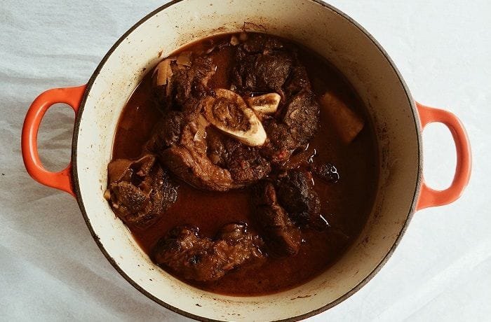 Chilean osso buco braised in dark beer with tomato sauce
