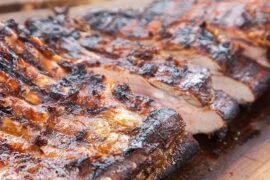 Chilean oven braised short ribs, asado de tira al horno, with red wine and onion sauce