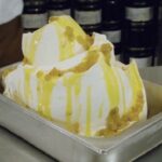 Chilean papaya cremino, a frozen cream dessert with papayas in syrup and lemon verbena