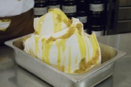 Chilean papaya cremino, a frozen cream dessert with papayas in syrup and lemon verbena