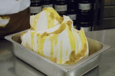 Chilean papaya cremino, a frozen cream dessert with papayas in syrup and lemon verbena