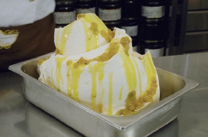 Chilean papaya cremino, a frozen cream dessert with papayas in syrup and lemon verbena