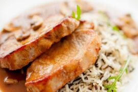 Chilean pork tenderloin braised in pisco with onion and parsley