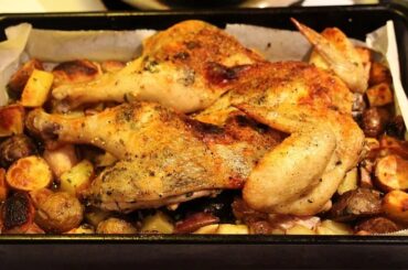 Chilean roast chicken with golden potatoes in a baking dish