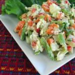 Chilean Russian salad with diced potato, carrot, peas, and green beans dressed with mayonnaise
