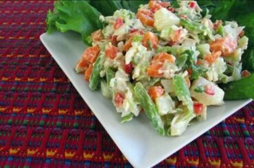 Chilean Russian salad with diced potato, carrot, peas, and green beans dressed with mayonnaise