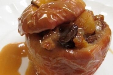 Chilean stuffed baked apples with walnuts, raisins, and cinnamon