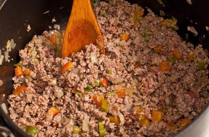 Chilean style ground beef with tomato and chili in a skillet
