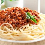 Chilean style spaghetti bolognese with parmesan