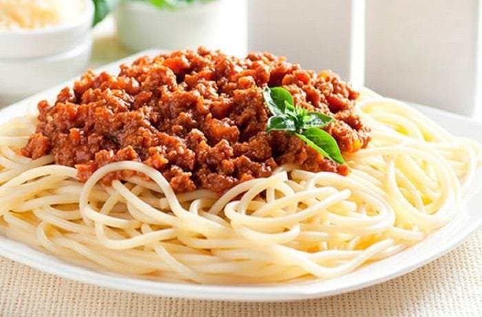 Chilean style spaghetti bolognese with parmesan