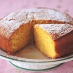 Chilean vanilla loaf cake, queque de vainilla, sliced and dusted with powdered sugar