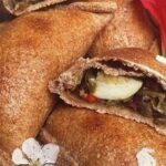 Baked Chilean vegetarian mushroom empanadas with whole wheat dough