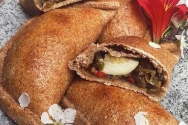 Baked Chilean vegetarian mushroom empanadas with whole wheat dough