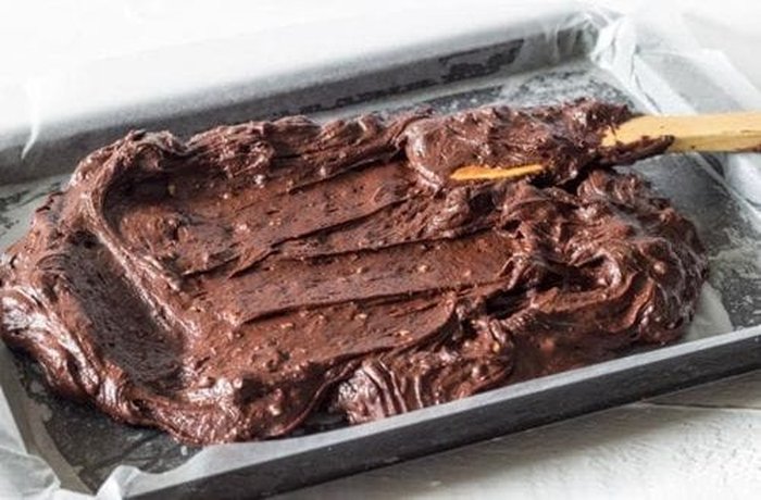 Chocolate brownie batter with walnuts and chocolate chips
