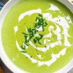 Homemade cream of spinach soup with ham and croutons