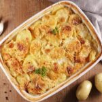 Baked creamy potatoes with cheese