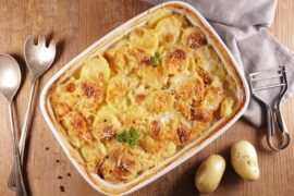 Baked creamy potatoes with cheese