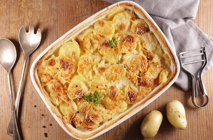 Baked creamy potatoes with cheese