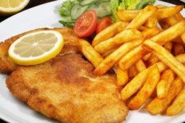 Crispy golden chicken milanesa with lemon