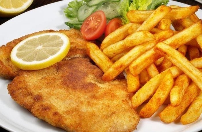 Crispy golden chicken milanesa with lemon