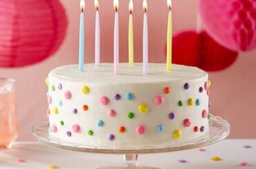 Homemade birthday cake with buttercream and sprinkles