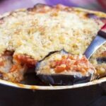 Homemade eggplant lasagna in a clay dish