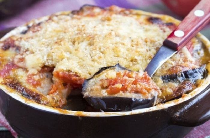 Homemade eggplant lasagna in a clay dish