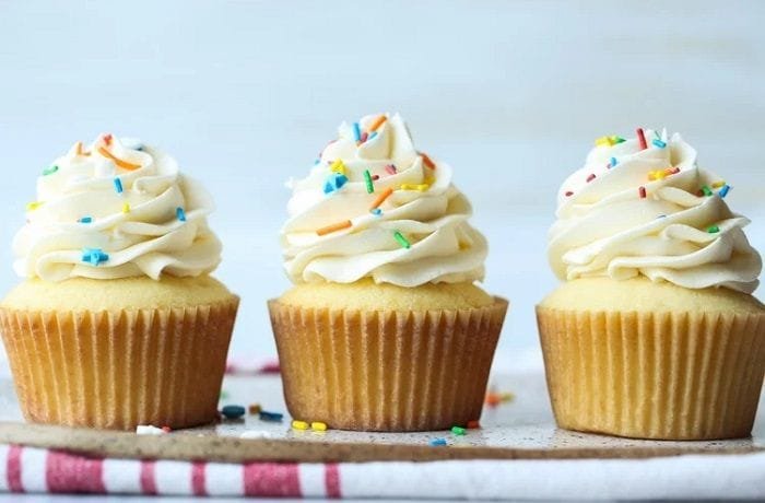 Fluffy vanilla cupcakes with buttercream swirls