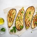Garlic roasted eggplant slices with fresh parsley