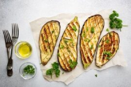 Garlic roasted eggplant slices with fresh parsley