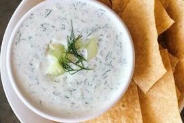 Greek yogurt, mayonnaise, and chive sauce in a bowl