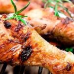 Grilled lemon chicken thighs with golden crispy skin