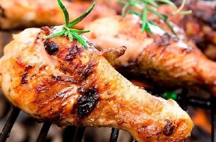 Grilled lemon chicken thighs with golden crispy skin