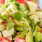Hearts of palm salad with avocado, apple, and tomato