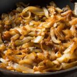 Homemade caramelized onions in a skillet
