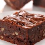 Homemade chocolate brownies with walnuts and chocolate chips, cut into squares