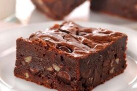 Homemade chocolate brownies with walnuts and chocolate chips, cut into squares