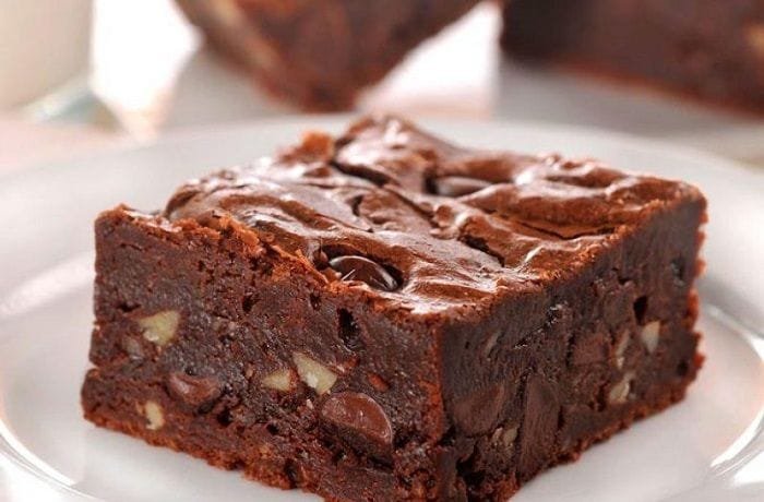 Homemade chocolate brownies with walnuts and chocolate chips, cut into squares