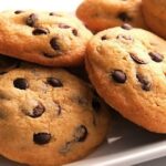 Homemade chocolate chip cookies on a cooling rack