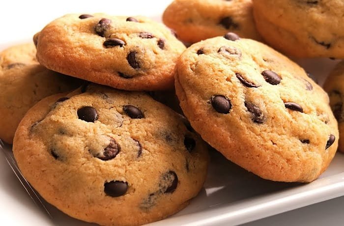Homemade chocolate chip cookies on a cooling rack