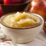 Homemade apple and cinnamon compote in a bowl