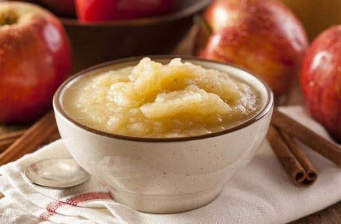 Homemade apple and cinnamon compote in a bowl