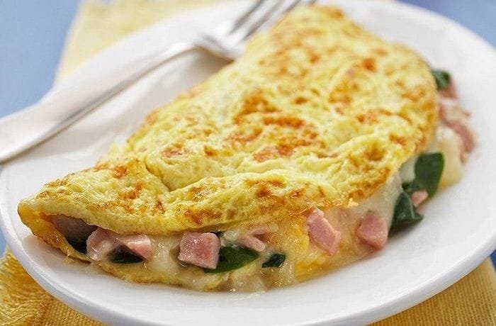 Homemade folded egg omelette with fillings
