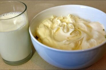 Bowl of homemade heavy cream made from milk and butter