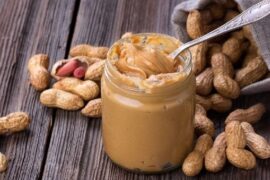 Homemade natural peanut butter in a jar