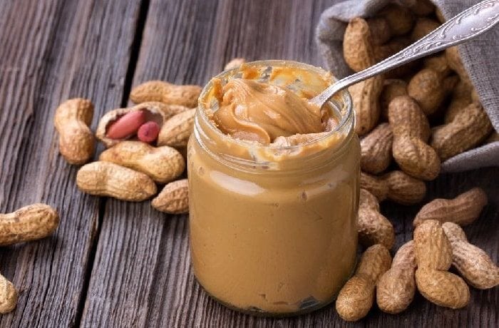 Homemade natural peanut butter in a jar