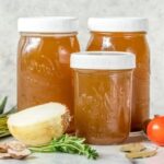 Homemade basic vegetable broth in a pot