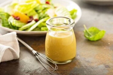 Honey mustard vinaigrette in a small jar